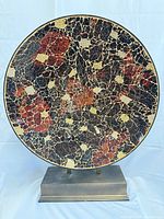 Front view of mosaic disk showing tile pattern and colors