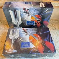 Two Longchamp Cristal d'Arques boxes showing brand and quantity