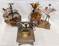 Overview of all three mixed-metal sculptures