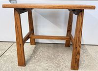 Side view showing Mission style legs and stretcher