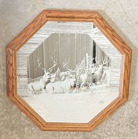 Front view of octagonal mirror showing full frame and etched deer scene