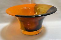 Side view showing flared rim, color transition and tapered base