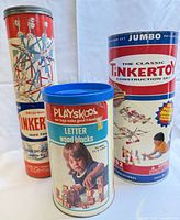 Three canisters: Original Tinkertoy, Playskool letter blocks, Classic Tinkertoy