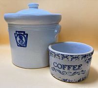 Pfaltzgraff crock with lid and Clay City coffee jar side by side