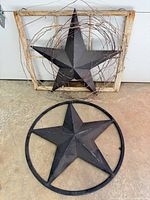 Both wall decor pieces shown together on floor