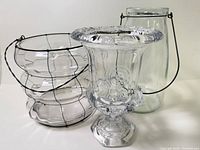 Group shot of all three clear glass pieces