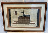 full view showing framed papyrus artwork with mat and frame