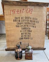 Entire lot showing framed coffee sack, grinder and lantern