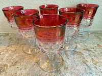 Set of six ruby flashed thumbprint goblets upright