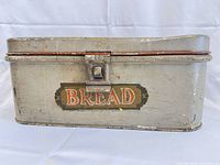 Front view of bread box showing decal, latch and overall color