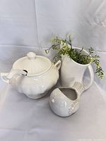 All three white ceramic items grouped together