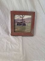 Front view of framed photograph showing Mail Pouch Tobacco barn