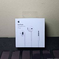 Front of retail box showing Apple EarPods branding and image