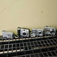 Wide shot of all four cameras lined up