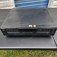 Front view showing controls and disc tray