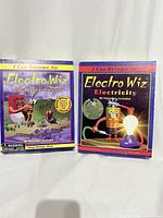 Front view of two Electro Wiz science kits showing titles Magnetism and Electricity