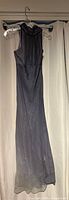 Full view of smokey blue-grey sleeveless maxi dress hanging