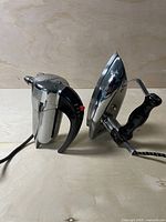 chrome hand mixer body and chrome iron side by side
