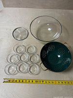 All items laid out with measuring tape for scale