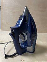 Left profile of Rowenta Steamforce iron showing handle, controls and cord