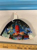 Front view of fleece hat showing multicolour Disney character graphic