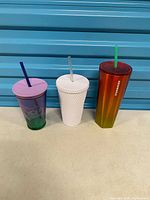 Front view of all three tumblers standing side by side