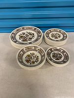 Stacks of four sizes of Dorset dinnerware on table