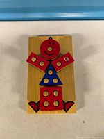 Top view of assembled wooden stacking puzzle figure