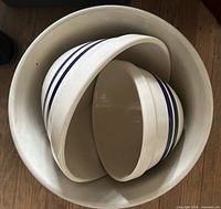 three nesting stoneware bowls inside each other