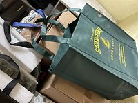 Reusable grocery bag and boxes containing jar sets