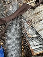 roll of mesh and fabric strip