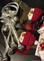 Bell cluster, snowman ornaments close-up