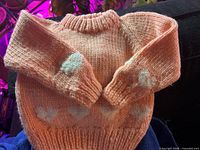 Peach knit sweater front view