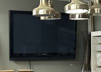 Front view of wall-mounted Panasonic plasma TV