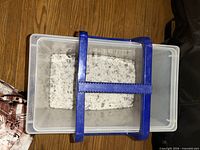 Top view showing interior filled with salt and blue handle