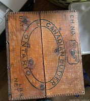 Top of wooden crate with Canadian Butter Ontario stencilling