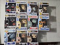 Group shot of all Funko Pop figures in boxes showing character names and numbers
