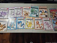 Group shot of all magazines laid out on table