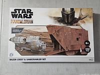 Front of box showing Star Wars Mandalorian Razor Crest & Sandcrawler Set 332 pcs