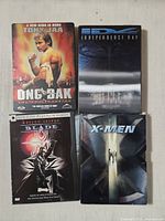 Front covers of all four DVD cases laid out