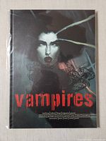 Front cover of shrink-wrapped Vampires hardcover book showing title and artwork
