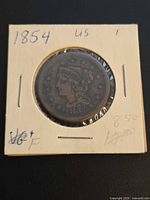 Obverse of 1854 Braided Hair Large Cent in 2x2 holder