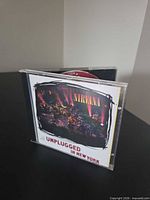 Front view of CD case showing album cover