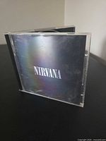 Front view of jewel case displaying album cover
