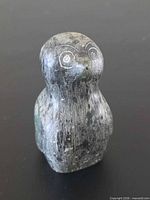 Front view of soapstone owl showing eyes and body