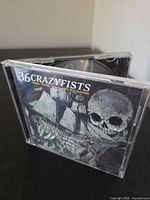 Front of jewel case showing album cover art and band name