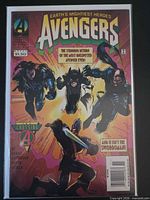 Front cover of Avengers #392 inside bag and board