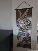 Full view of hanging scroll on wall