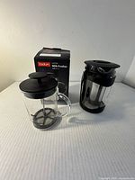Bodum frother with plunger, Primula coffee maker, Bodum box group shot