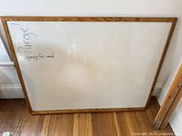 Front view of oak framed whiteboard